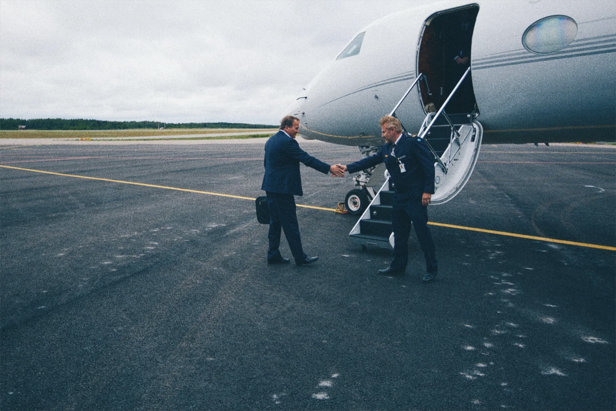 A greeting at the steps of an aircraft