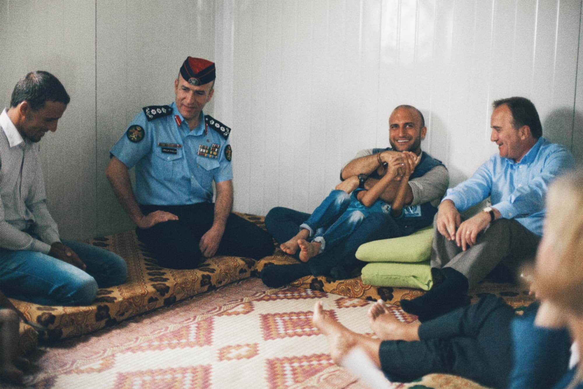 A seated conversation during a visit