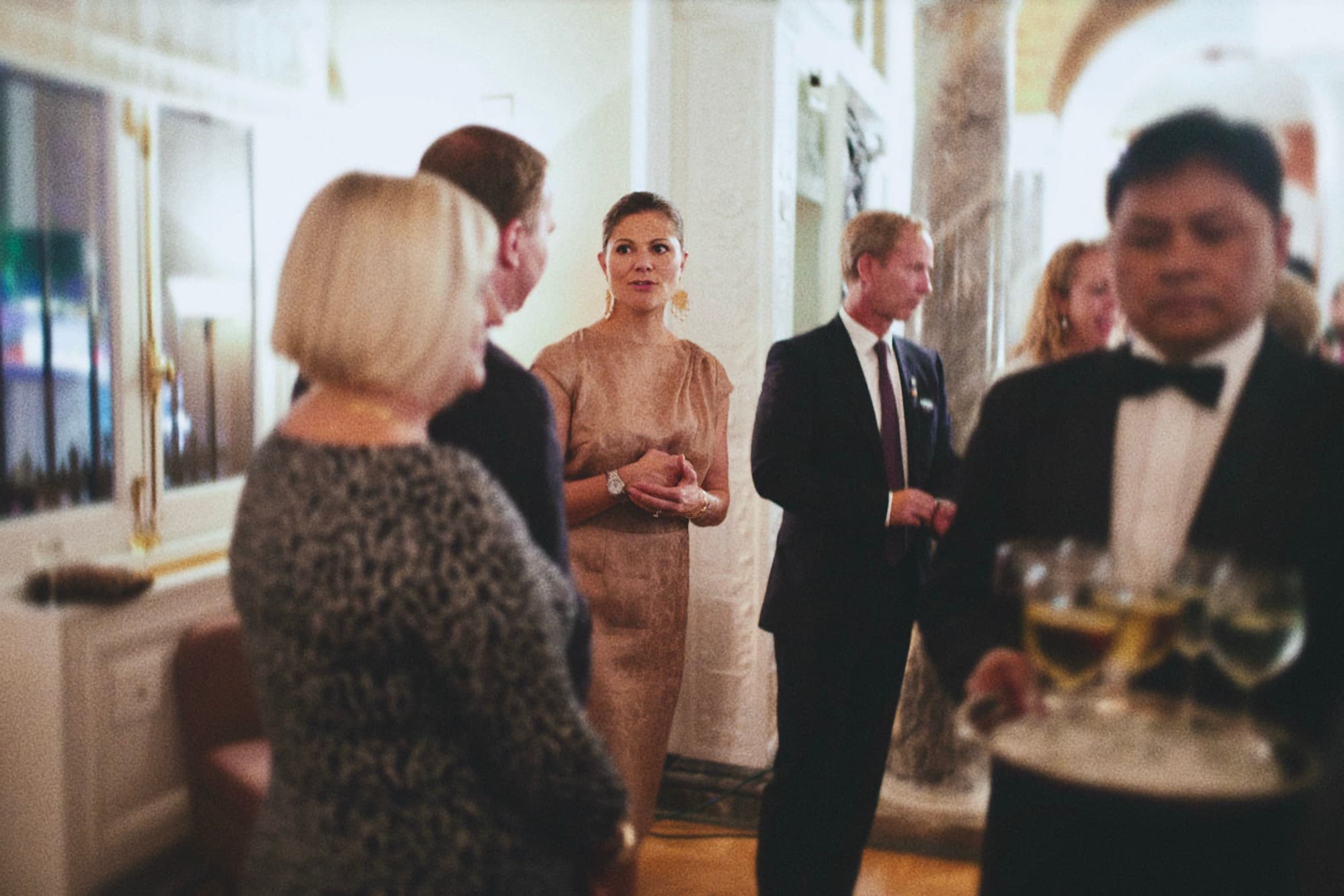 Guests talking at a formal reception