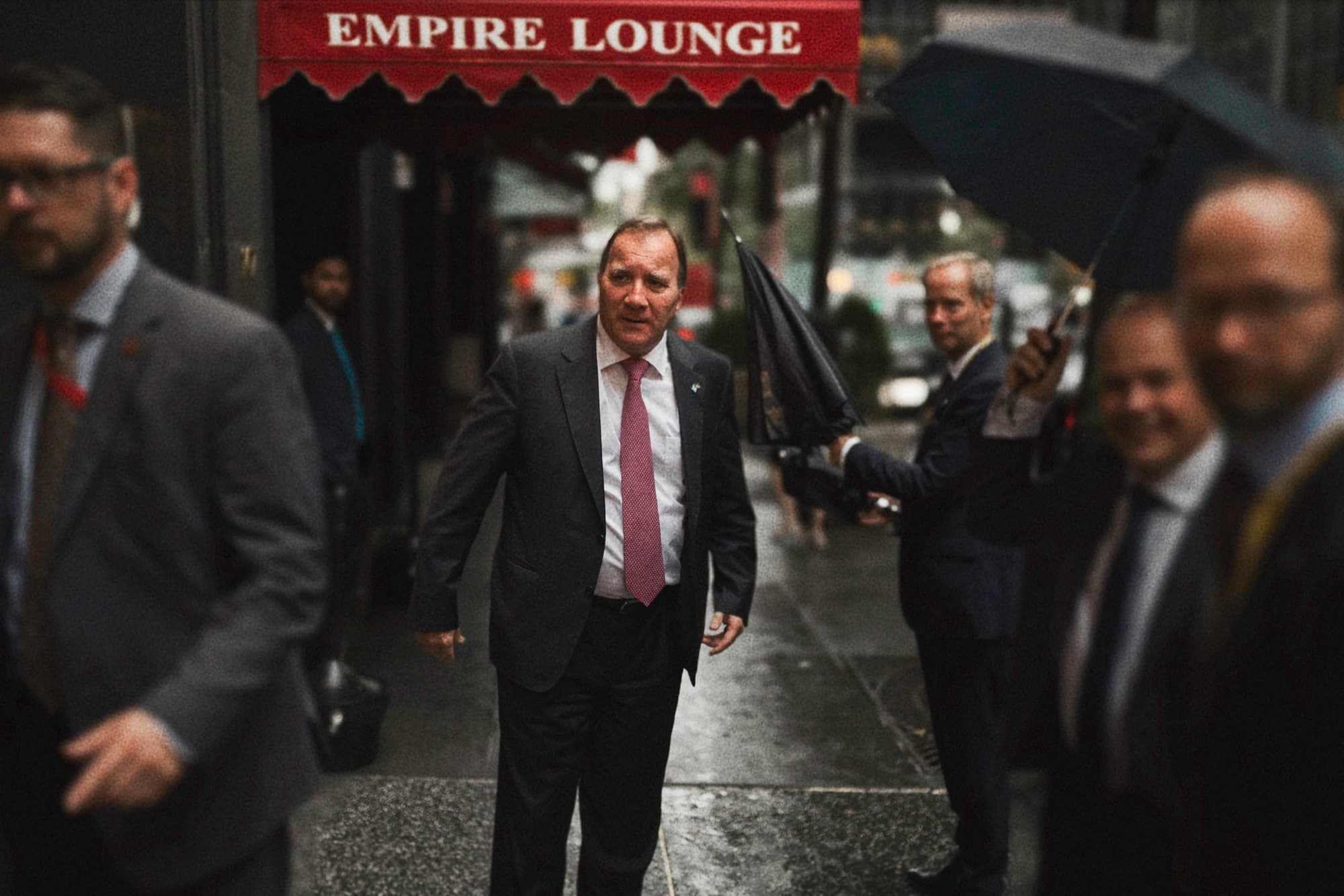 A delegation walking outside the Empire Lounge